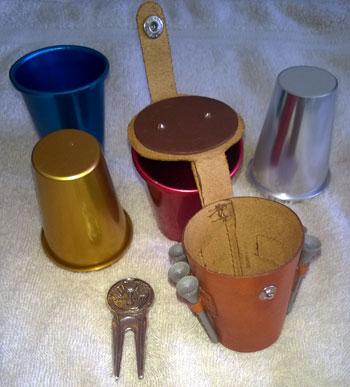 1997-Ryder-Cup-Valderrama-set-of-stirrups-cups,-golfing-ball-markers,-divot-replacer,-golf-tees-memorabilia