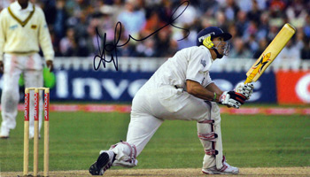 KEVIN PIETERSEN (England) Signed magazine picture of the controversial batsman in action - batting for England and reverse sweeping Muttiah Muralitharan for a memorable six.