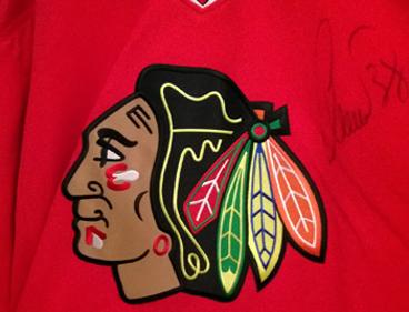 CHRISTOBAL HUET (France) (Goalie - 2010 Stanley Cup winner) signed Chicago Blackhawks jersey & cap. 