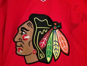 CHRISTOBAL HUET (France) (Goalie - 2010 Stanley Cup winner) signed Chicago Blackhawks jersey & cap.