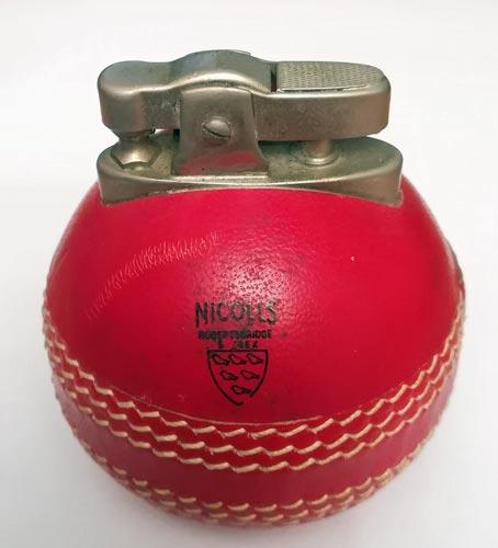 Cricket-Ball-Cigarette-Lighter-gray-nicolls-novelty-memorabilia-robertsbridge-east-sussex-collectable-red-leather-seam